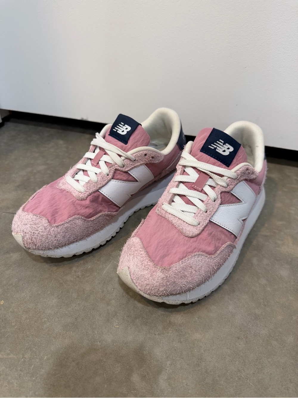 New Balance Women’s Pink and White 237 Sneakers with Navy Logo